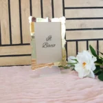 Segnatavolo in plexiglass con cornice specchiata